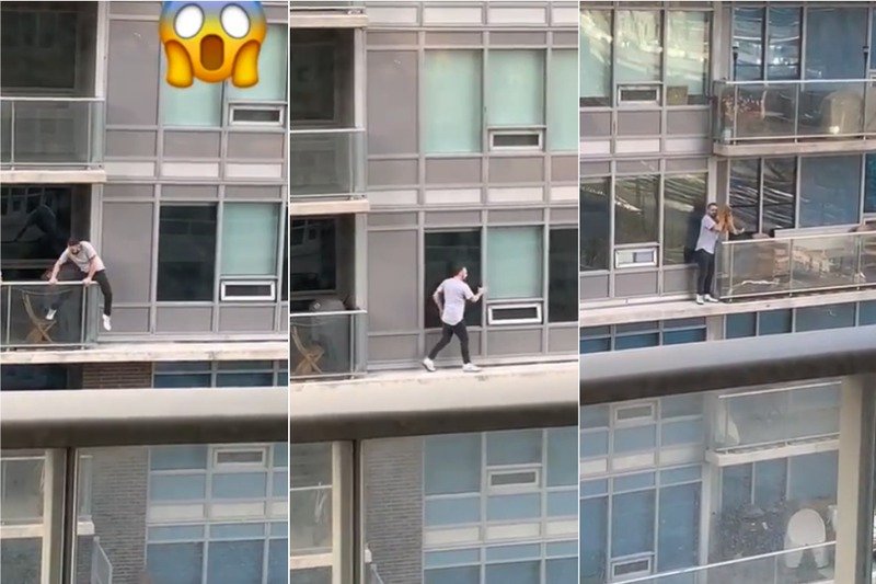 Arriesga la vida caminando por la cornisa de un edificio para salvar a un gato (VIDEO)y