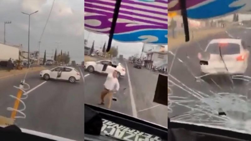 Conductor enfurece contra chofer de microbús y le apedrea el parabrisas (Video)