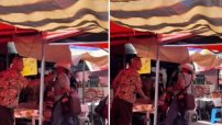 Extranjero intenta callar a músico en tianguis y comerciantes lo defienden 